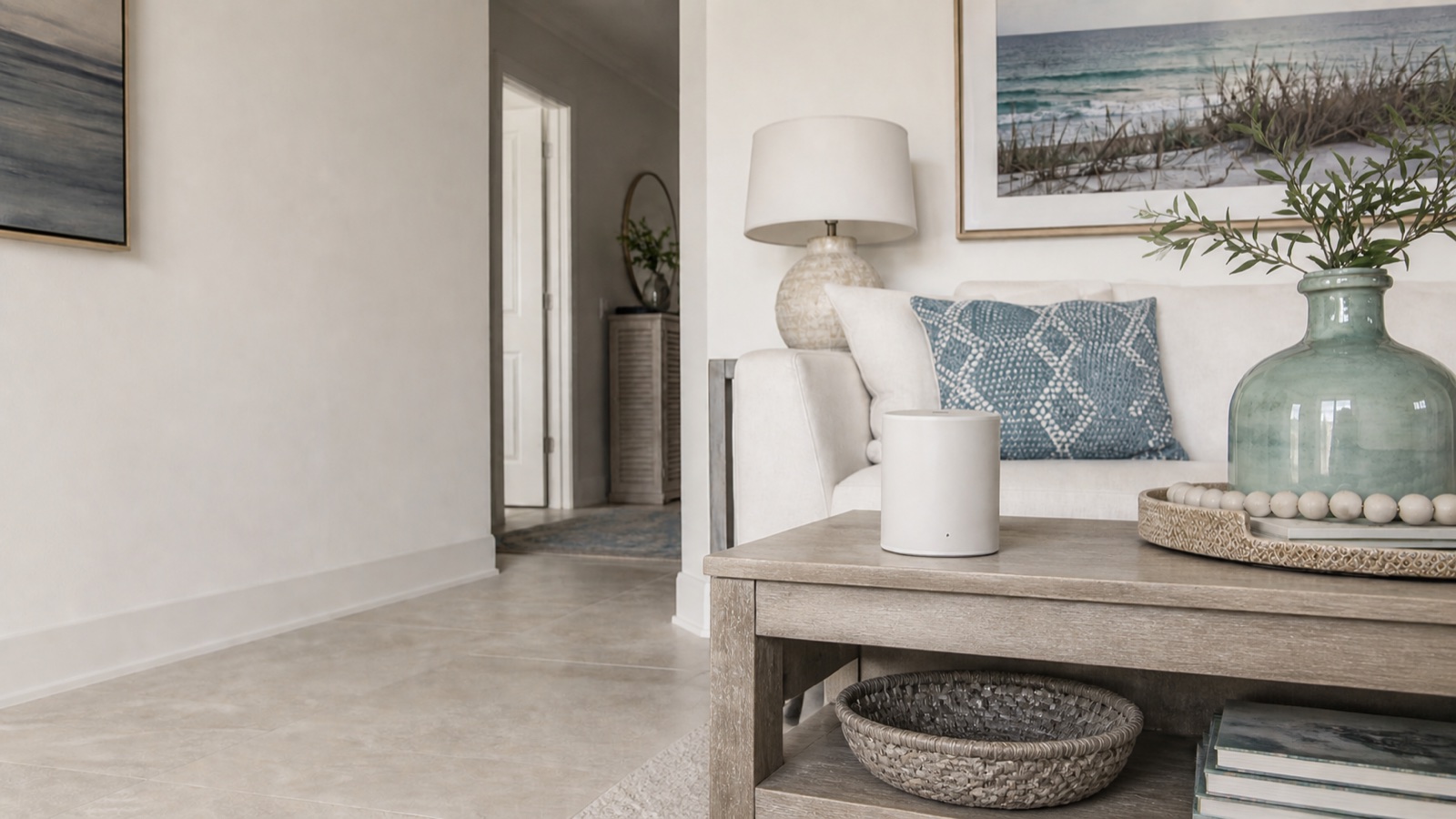 An unbranded radon monitor on a stable table in a calm coastal Florida living room.
